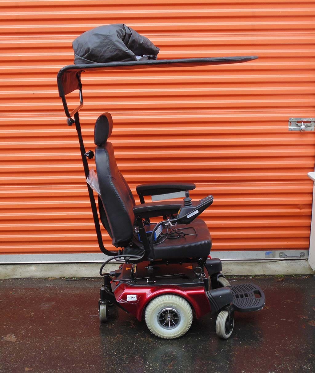 Shoprider power chair with roof and cover